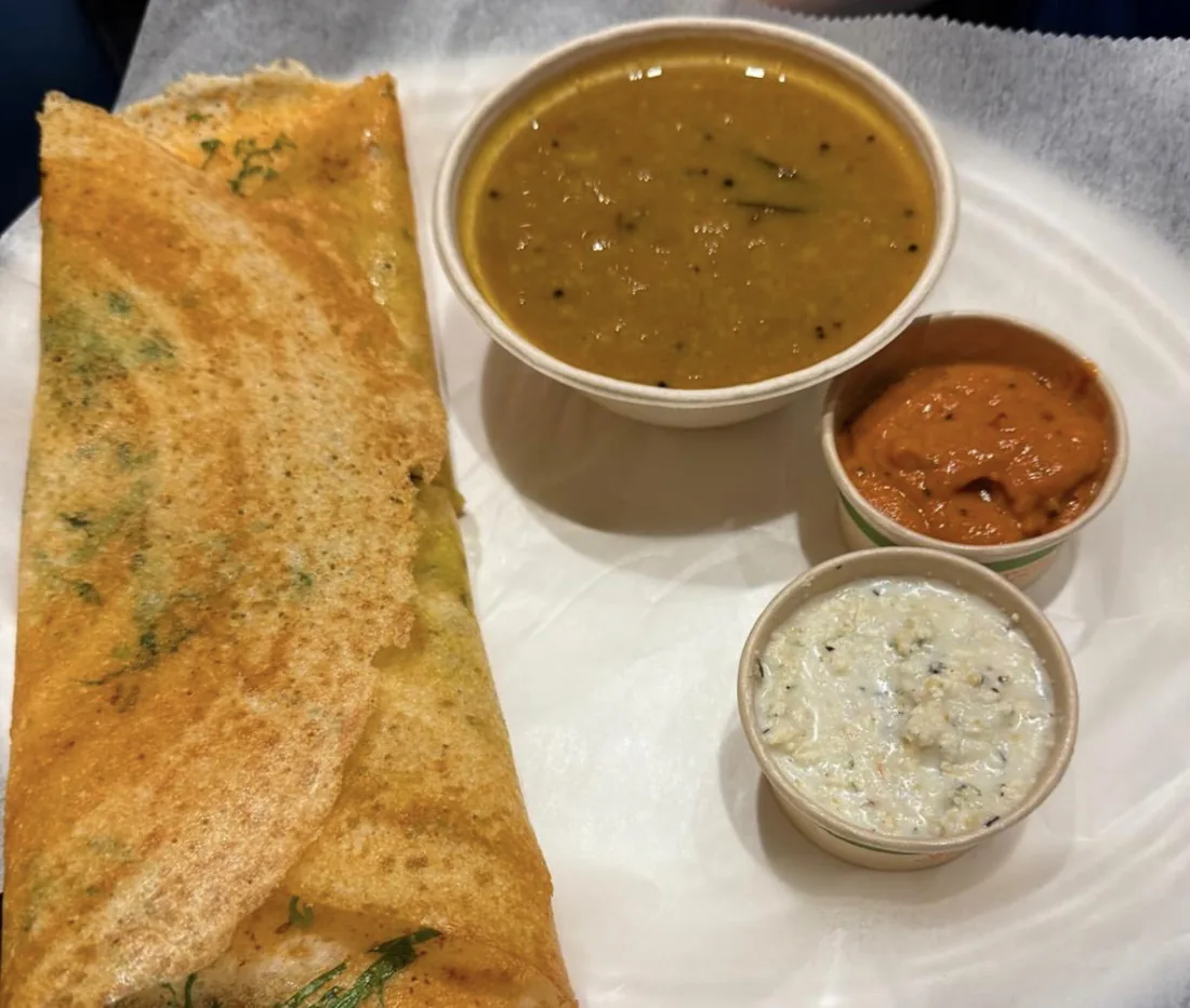 Potato masala dosa with sambar and chutneys
